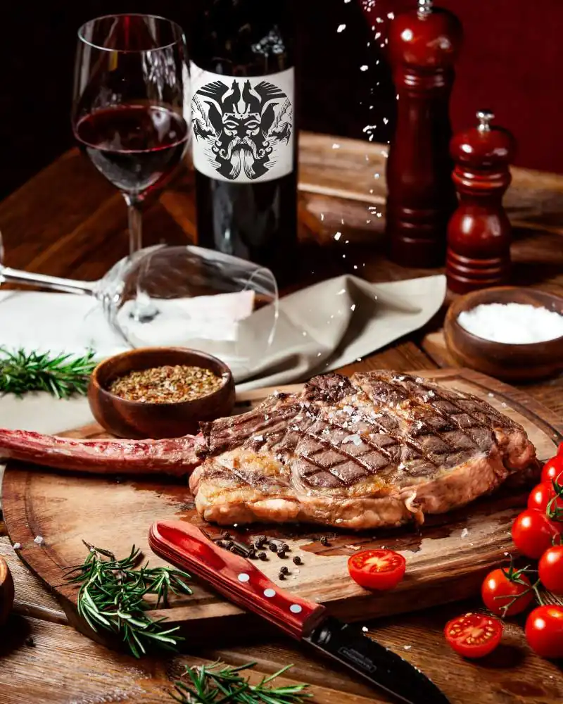 Two Steaks & Bottle of House wine £49 in Den of Bracca